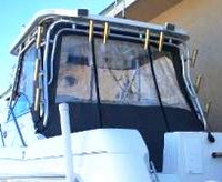 Photo of Aquasport 275 Explorer, 2004: Hard-Top, Front Connector, Side Curtains, Aft-Drop-Curtains, viewed from Port Rear 