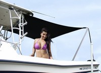 Boat-Shade-Kit™Shade Extension Kit connects to rear (covers cockpit) or front (bow dodger) of T-Top, Hard-Top, Bimini or Sunshade Top frame or Salon to provide up to 100 square feet of shade from the sun and harmful UV rays (click for full-size picture) Boat-Shade-Kit™Shade Extension Kit connects to rear (covers cockpit) or front (bow dodger) of T-Top, Hard-Top, Bimini or Sunshade Top frame or Salon to provide up to 100 square feet of shade from the sun and harmful UV rays