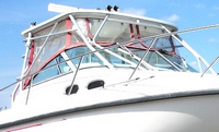 Photo of Boston Whaler Conquest 28, 2001: Hard-Top, Front Visor, Side Curtains, Aft-Drop-Curtain, viewed from Starboard Front 