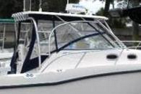 Photo of Boston Whaler Conquest 305, 2005: Hard-Top, Front Connector, Side Curtains, Aft-Drop-Curtain Zipped Open, viewed from Starboard Side 