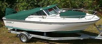 Photo of Boston Whaler Dauntless 17, 1997:, Bow Cover Cockpit Cover to Top of WindShield Forest Green Sunbrella, viewed from Starboard Front 
