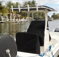 Photo of Boston Whaler Dauntless 210, 2017 Canvas T-Top Console-Cover T-Top Reversible Pilot Seat Cover, viewed from Starboard Rear 