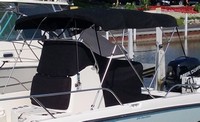 Photo of Boston Whaler Dauntless 210, 2018 Bimini Top Console Reversible Pilot Seat Cover No T-Top, viewed from Port Front 