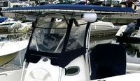 Photo of Boston Whaler Outrage 240, 2003: T-Top, Visor, Side Curtains Sea Covers, viewed from Port Front 