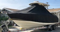 Photo of Boston Whaler Outrage 250 20xx TTopCover™ T-Top boat cover, viewed from Port Front 