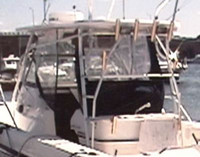 Photo of Boston Whaler Outrage 28, 2001: Hard-Top, Visor, Side Curtains, Aft-Drop-Curtain, viewed from Port Rear 2 
