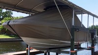 Photo of Boston Whaler Vantage 230 Tower 20xx TTopCover™ T-Top boat cover On Lift, viewed from Port Front 