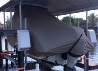 Photo of Boston Whaler Vantage 230 Tower 20xx TTopCover™ T-Top boat cover On Lift, viewed from Port Rear 
