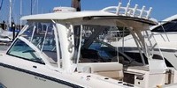 Photo of Boston Whaler Vantage 320 Hard-Top, 2017 Hard-Top, Visor, Side and Aft Curtains White Stamoid, viewed from Port Rear 