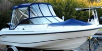 Photo of Boston Whaler Ventura 180, 2006: Bimini Top, Front Visor, Side Curtains, Bow Cover, viewed from Starboard Front 