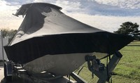 Photo of Carolina Skiff 258 DLV 20xx TTopCover™ T-Top boat cover, viewed from Starboard Front 