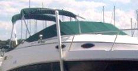 Photo of Chaparral 240 Signature, 2000: Bimini Top in Boot, Camper Top in Boot, Cockpit Cover, viewed from Starboard Front 