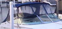 Photo of Chaparral 245 SSI, 2001: Bimini Top, Connector, Side Curtains, Aft Curtain, viewed from Starboard Front 