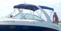Photo of Chaparral 265 SSI Radar Arch, 2004: Bimini Top, Camper Top, Camper Side, viewed from Port Front 