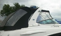 Photo of Chaparral 290 Signature Canvas Under Arch, 2004: Bimini Top, Side Curtains, Camper Frame, Camper Aft Curtain, viewed from Starboard Rear 