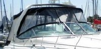 Photo of Chaparral 310 Signature NO or Under Arch, 2005: Bimini Top, Connector, Side Curtains, Camper Top, Camper Side Aft Curtains, viewed from Starboard Front 