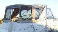 Photo of Chaparral 320 Signature Arch, 2003: Bimini Top, Front Connector, Side Curtains, Camper Top, Camper Side and Aft Curtains tan, viewed from Starboard Rear 