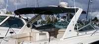 Photo of Chaparral 330 Signature Arch, 2004: Bimini Top, Camper Top under Arch, viewed from Starboard Rear 