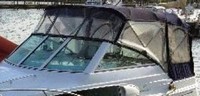 Photo of Chris Craft Constellation 26, 2001: Bimini Top, Front Connector, Side Curtains, Camper Top, Camper Side and Aft Curtains, viewed from Port Front 