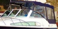 Photo of Chris Craft Constellation 26, 2003: Bimini Top, Front Connector, Side Curtains, Camper Top, Camper Side and Aft Curtains Captain-Navy Sunbrella, viewed from Port Front 