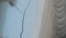 Cracked Tube under Silver Painted Weld