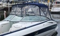 Photo of Crownline 320 LS No Arch, 2006: Bimini Top frotn Connector, Side Curtains, viewed from Port Front 