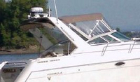Photo of Formula 31 PC, 2001: Bimini, Front Connector, Side Curtains, viewed from Starboard Side 