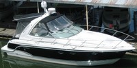 Photo of Formula 31 PC, 2006: Bimini Top, Connector, Side Curtains, Camper Top, Camper Side and Aft Curtains, viewed from Starboard Front, Above 