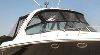 Photo of Formula 330 SS, 2005: Bimini Top, Front Connector, Side Curtains, Camper Top, Camper Side and Aft Curtains, viewed from Starboard Front 