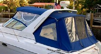 Photo of Formula 34 PC, 2000: Bimini Top, Front Connector, Side Curtains, Camper Top, Camper Side and Aft Curtains, viewed from Port Rear 