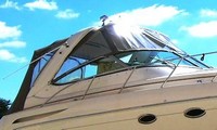 Photo of Formula 37 PC, 2003: Bimini Top, Connector, Side Curtains, Camper Top, Camper Side and Aft Curtains, viewed from Starboard Front 