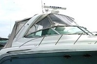 Photo of Formula 37 PC, 2004: Bimini Top, Connector, Side Curtains, Camper Top, Camper Side and Aft Curtains, viewed from Starboard Front 