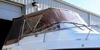Photo of Glastron GS 249 Taylor Made, 2004: Bimini Top, Front Connector, Side Curtains, Camper Top, Camper Side and Aft Curtain, viewed from Starboard Front 