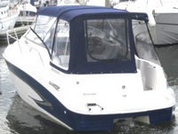 Photo of Glastron GS 249, 2000: Bimini Top, Connector, Side Curtains, Camper Top, Camper Side and Aft Curtains, viewed from Port Rear 