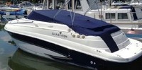 Photo of Glastron GS 259, 2007: No Arch Bimini Top in Boot, Cockpit Cover, viewed from Port Rear 