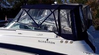 Photo of Glastron GS 259, 2007: No Arch Bimini Top, Front Connector, Side Curtains, Camper Top, Camper Side and Aft Curtains, viewed from Port Side 