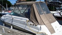 Photo of Glastron GS 259, 2007: No Arch Bimini Top, Front Connector, Side and Aft Curtains (No Camper), viewed from Port Rear 