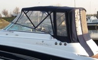 Photo of Glastron GS 259, 2008: No Arch Bimini Top, Visor, Side Curtains, Camper Top, Camper Side and Aft Curtains, viewed from Port Rear 