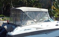 Photo of Godfrey Hurricane Sundeck 260, 2004: Bimini Top, Front Connector, Side And Aft Curtains, viewed from Starboard Side 