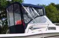 Photo of Grady White Adventure 208, 2003: Bimini Top, Front Visor, Side and Aft Curtains, viewed from Starboard Rear 