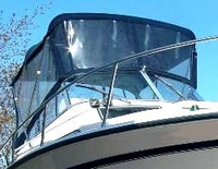 Photo of Grady White Islander 268, 1998: Factory OEM Vista Bimini Top, Front Visor, Side Curtains, Aft-Drop-Curtain, viewed from Starboard Front 