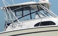Photo of Grady White Marlin 300, 2001: Hard-Top, Front Visor, Side Curtains, viewed from Starboard Side 