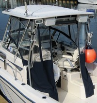 Photo of Grady White Seafarer 226, 2001: Hard-Top, Visor, Side Curtains, Aft-Drop-Curtain, viewed from Port Rear 