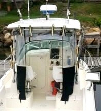 Photo of Hydrasports 230WA, 2004: Factory Hard-Top, Connector, Side Curtains, Aft-Drop-Curtain open, Rear 