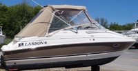 Photo of Larson Cabrio 220, 2006: Bimini Top, Connector, Side Curtains, Aft Curtains, viewed from Starboard Side 