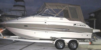 Photo of Larson Cabrio 220, 2009: Bimini Top, Connector, Side Curtains, Camper Top, Camper Side and Aft Curtains, viewed from Port Side 