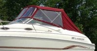 Photo of Larson Cabrio 244, 1999: Bimini Top, Front Connector, Side and Aft Curtains, viewed from Port Front 