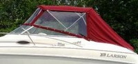 Photo of Larson Cabrio 244, 1999: Bimini Top, Front Connector, Side and Aft Curtains, viewed from Port Side 