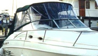 Photo of Larson Cabrio 254, 1999: Bimini Top, Connector, Side Curtains Bimini Aft Curtain, viewed from Starboard Front 