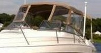 Photo of Larson Cabrio 254, 2001: Bimini Top, Connector, Side Curtains, Camper Top, Camper Side Curtains, Camper Aft Curtain, viewed from Port Front 